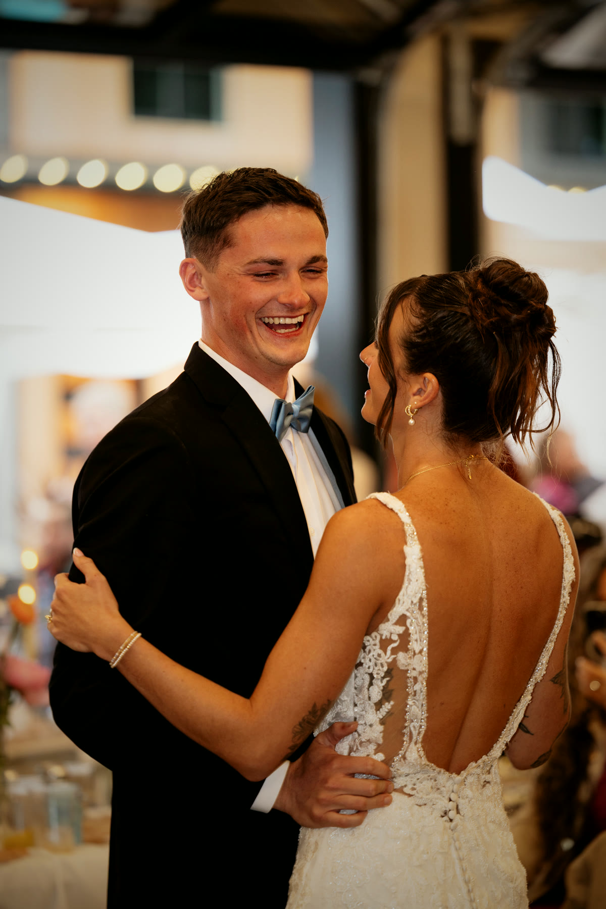 A first dance under warm festoon lighting